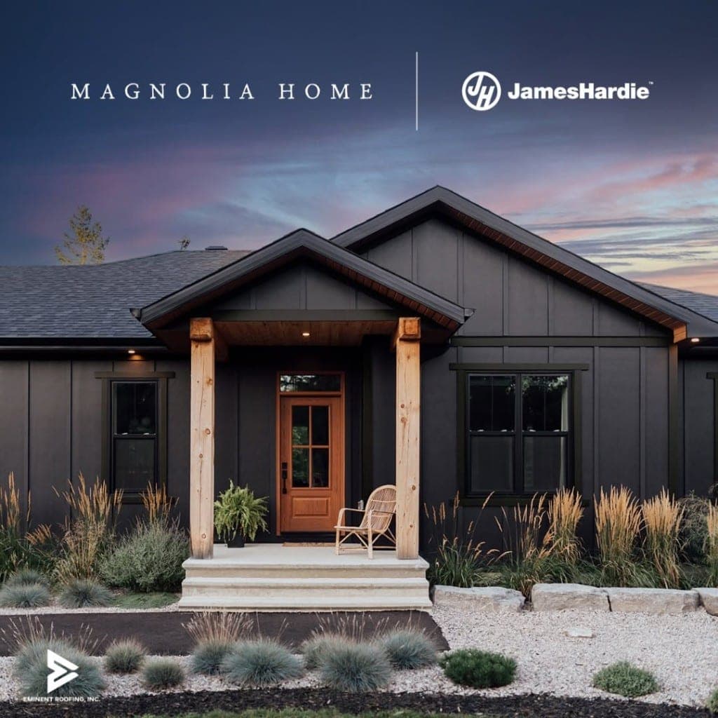 Modern Tri-Cities home with dark board and batten siding at dusk