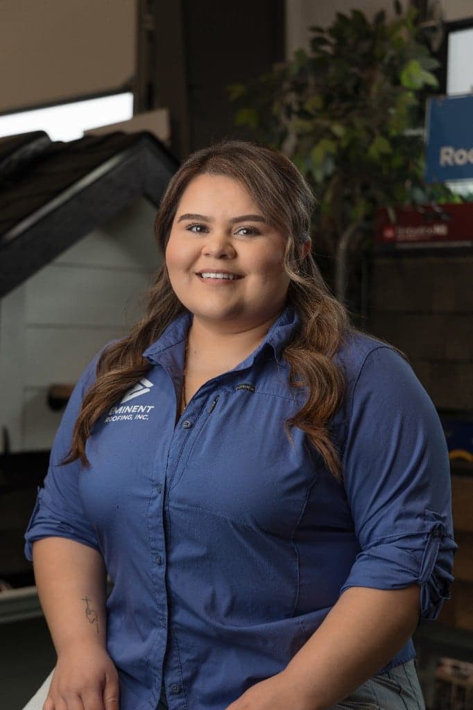 Yisel Lopez, Office Administrator at Eminent Roofing, in the Richland showroom